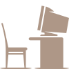 Chair and computer on black background.